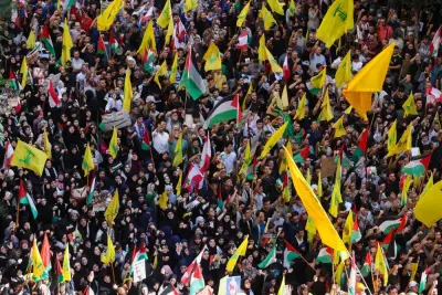Hezbollah supporters carry flags during a protest, after hundreds of Palestinians were killed in a blast at Al-Ahli hospital in Gaza that Israeli and Palestinian officials blamed on each other, in Beirut's southern suburbs, Lebanon Wednesday. REUTERS Hezbollah supporters carry flags during a protest, after hundreds of Palestinians were killed in a blast at Al-Ahli hospital in Gaza that Israeli and Palestinian officials blamed on each other, in Beirut's southern suburbs, Lebanon Wednesday. REUTERS