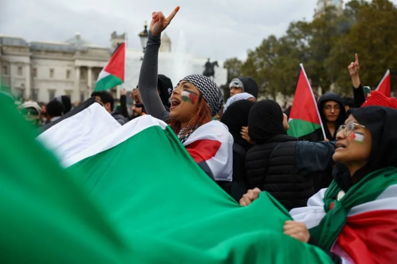 Demonstrators protest in solidarity with Palestinians in Gaza, amid the ongoing conflict between Israel and the Palestinian group Hamas, in London, Saturday. REUTERS