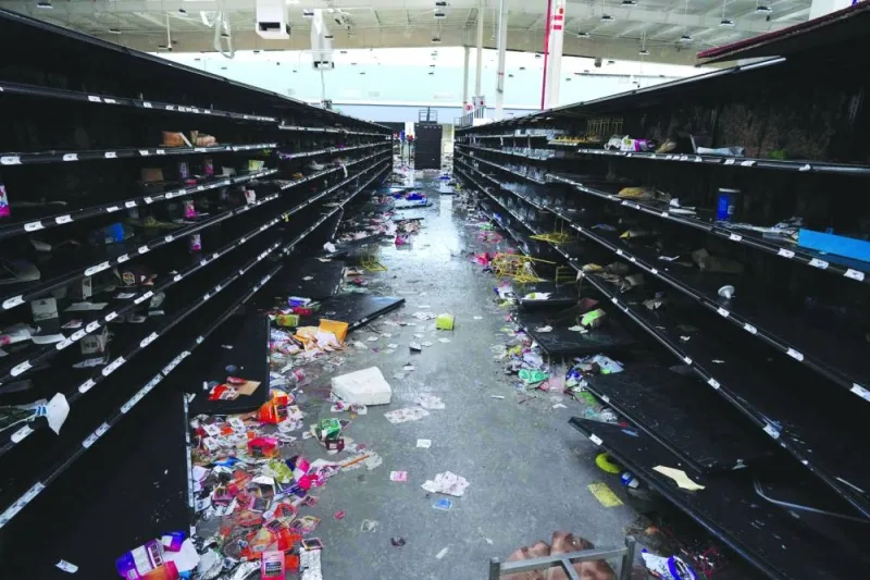
View of a looted supermarket in the aftermath of Hurricane Otis in Acapulco. 