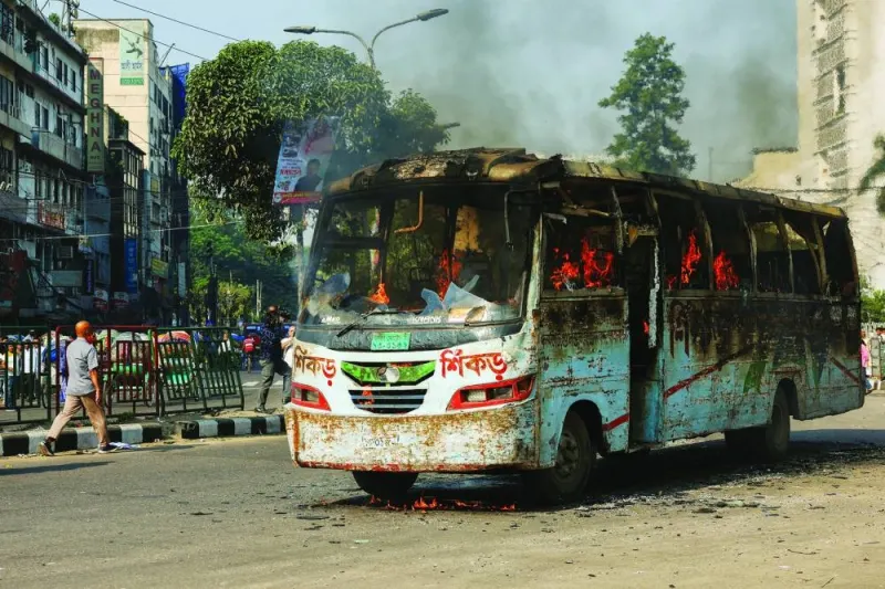 
Unidentified miscreants set a public bus on fire during a countrywide strike from dawn to dusk called by the Bangladesh Nationalist Party, protesting against the alleged police attacks on their Saturday rally in Dhaka yesterday. (Reuters) 
