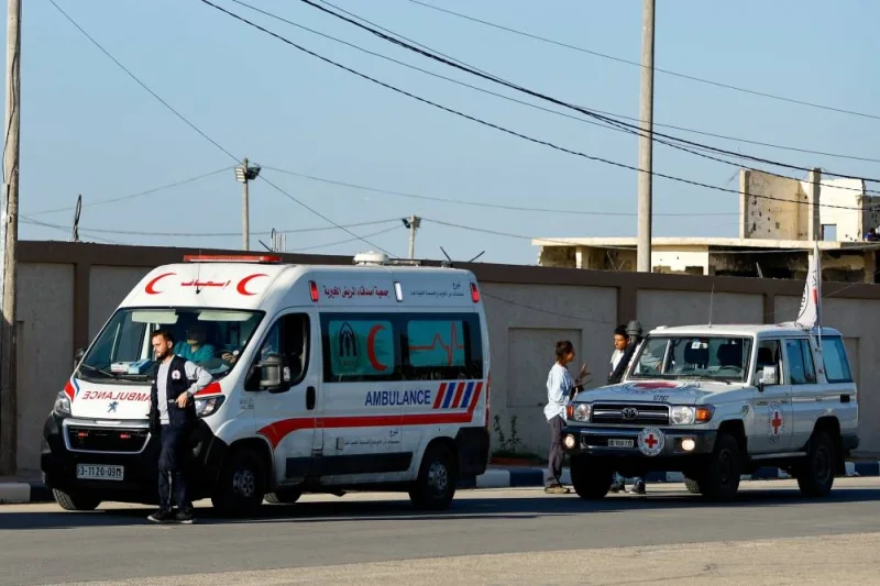 An ambulance for injured Palestinians who will be transported to receive treatments at Egyptian hospitals, waits to move towards the Egyptian side of Rafah crossing, in Rafah in the southern Gaza Strip, on Tuesday. REUTERS