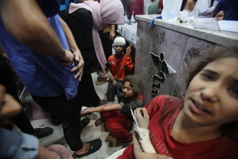 Injured children await treatment at the emergency ward of the Al-Shifa hospital following an Israeli strike, in Gaza City on Sunday. AFP