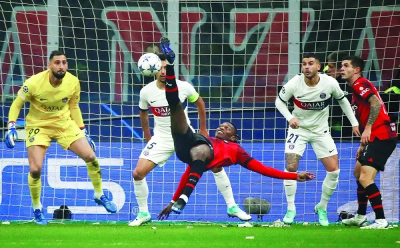 
AC Milan’s Rafael Leao scores against Paris St Germain during the Champions League Group F match in Milan on Tuesday. (Reuters) 