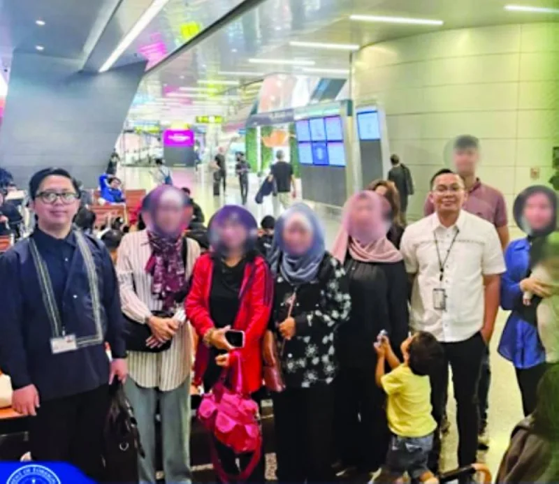 The first batch of Filipino nationals, who were displaced from their homes in Gaza, received assistance from embassy officials during a layover in Doha&#039;s Hamad International Airport (screengrab from embassy Facebook page).