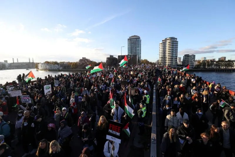 People demonstrate on Vauxhall Bridge during a protest in solidarity with Palestinians in Gaza, in London, on Saturday. REUTERS