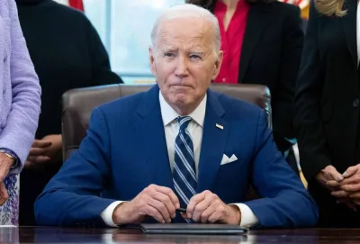 US President Joe Biden looks on after signing a Presidential Memorandum establishing the first-ever White House Initiative on Women’s Health Research, in the Oval Office of the White House in Washington, DC, Monday. AFP