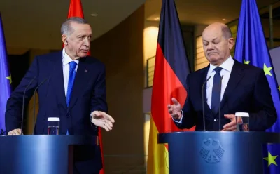 German Chancellor Olaf Scholz and Turkish President Tayyip Erdogan attend a press conference at the Chancellery in Berlin, Germany, Friday. REUTERS