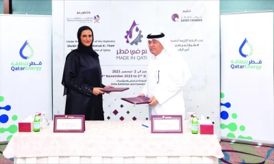 Hussain Yousef al-Abdulghani, director of the Administrative and Finance Department at Qatar Chamber, and Lolwa Khalil Salat, manager of Public Relations and Communication at QatarEnergy, during the signing ceremony held recently.