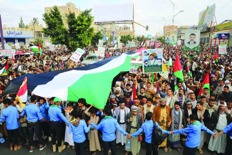Yemenis march during a rally to show solidarity with Palestinians yesterday.