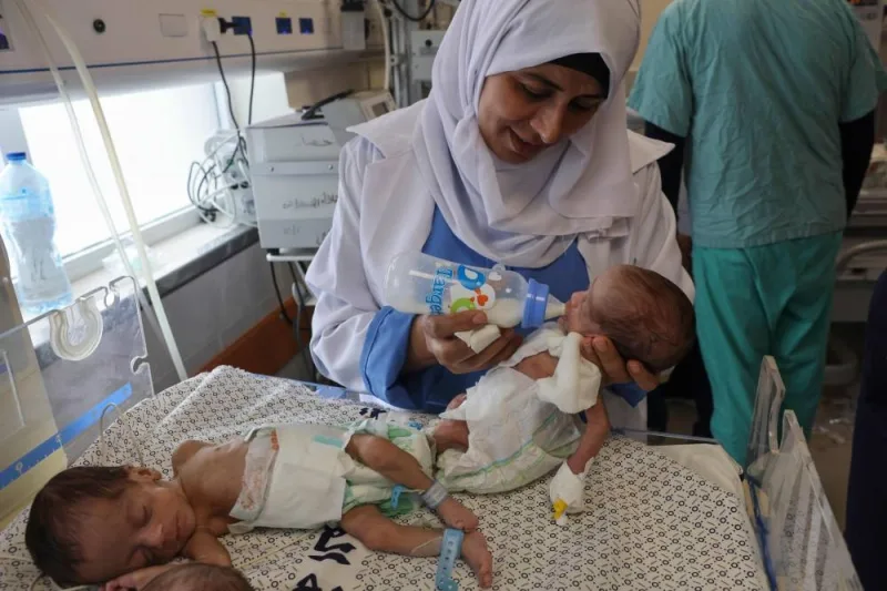 Palestinian medics care for premature babies evacuated from Al Shifa hospital to the Emirates hospital in Rafah in the southern Gaza Strip, on Monday. AFP