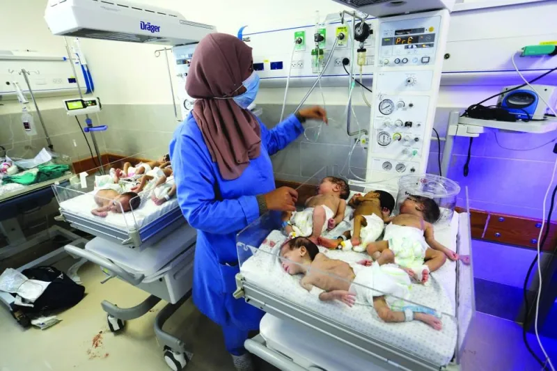 
Premature babies evacuated from an incubator in Al Shifa Hospital in Gaza City receive 
treatment at an hospital in Rafah, in the southern Gaza Strip, yesterday. 