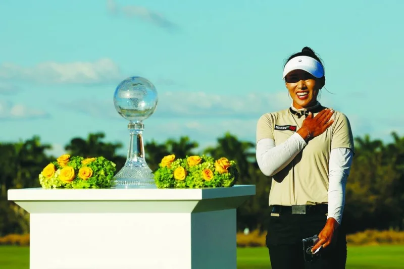 
Amy Yang of Korea looks on during the trophy ceremony after winning the CME Group Tour Championship at Tiburon Golf Club in Naples, Florida. (AFP) 
