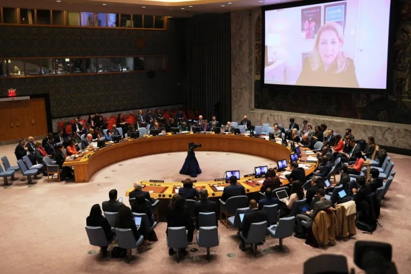 Members of the UN Security Council watch as Executive Director of UNICEF Catherine Russell speaks on a screen during a meeting on the situation in the Middle East, and the Israel-Hamas war at the United Nations headquarters on Wednesday in New York City. Getty Images/AFP