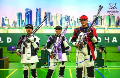 
10m air rifle women’s gold medallist Aneta Stankiewicz (centre) of Poland, silver medallist Wang Zhilin (left) of China and Jeanette Duestad of Norway pose after the final during the ISSF World Cup Finals at the Lusail Shooting Range yesterday, 