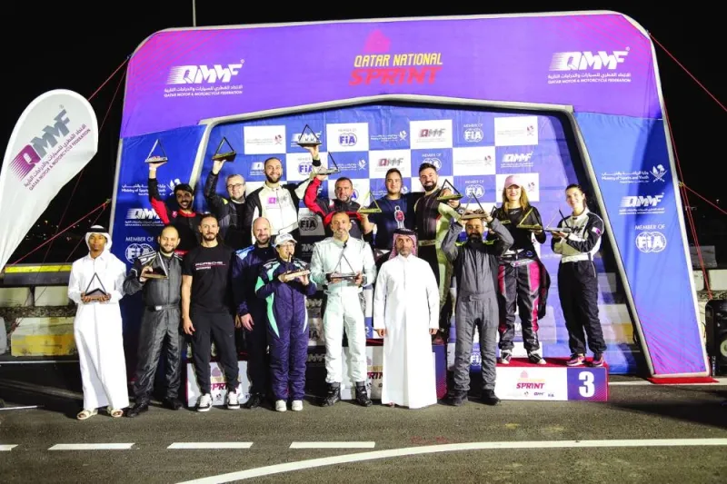 Participants with QMMF officials at the end of the penultimate round of the Qatar National Sprint.