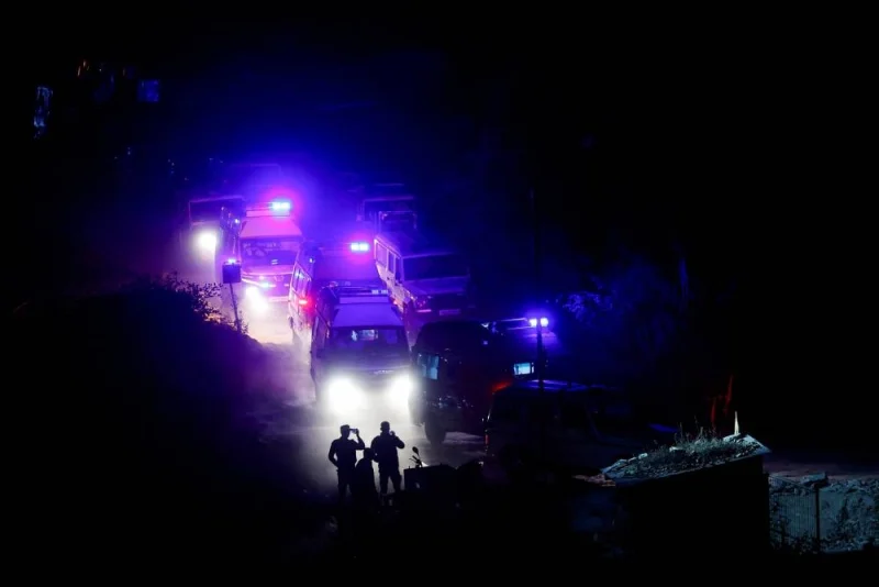Emergency vehicles operate at the site where workers are trapped after a tunnel collapsed, in Uttarkashi, in the northern state of Uttarakhand, India, Tuesday. REUTERS