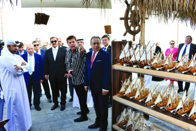 Katara general manager Prof Dr Khalid bin Ibrahim al-Sulaiti and other dignitaries tour the festival Tuesday. PICTURE: Thajudheen