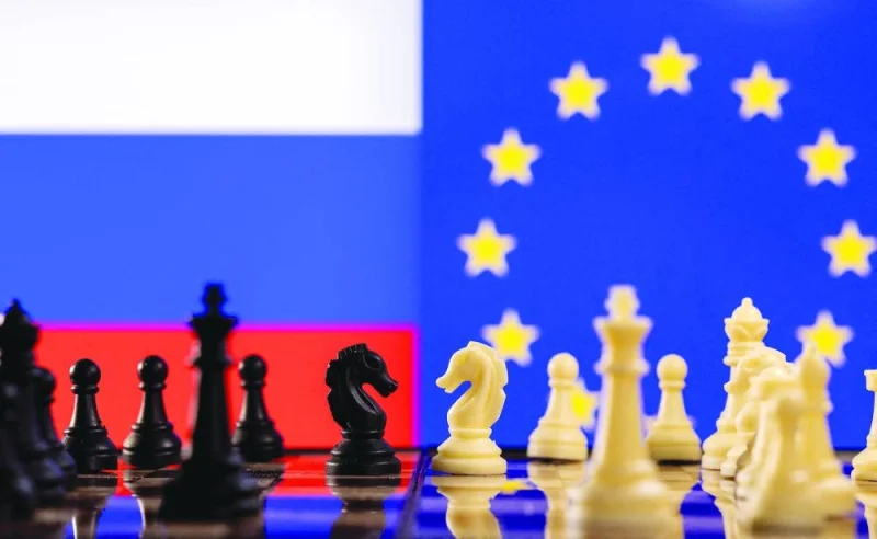 Chess pieces are seen in front of displayed Russian and EU flags in this illustration taken last year. (Reuters)