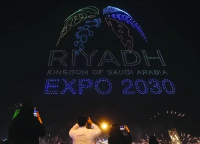 People watch fireworks and a light show, as Saudi Arabia celebrates winning its bid to host the World Expo 2030, in Riyadh yesterday.