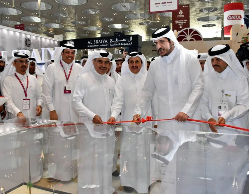 The dignitaries during a tour of the pavilions of the participating industrial companies at the exhibition.