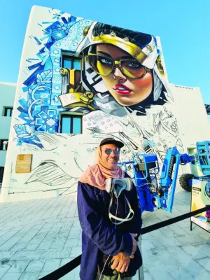 Australian Sofles’s mural combines traditional patterns, a futuristic figure with a headdress, and a fish to symbolise the artwork&#039;s location at the port. PICTURE: Joey Aguilar