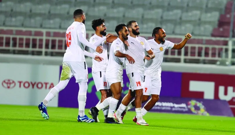 
Umm Salal’s Oussama Tannane (second right) celebrates with teammates after scoring against Al Duhail in the Expo Stars League. 