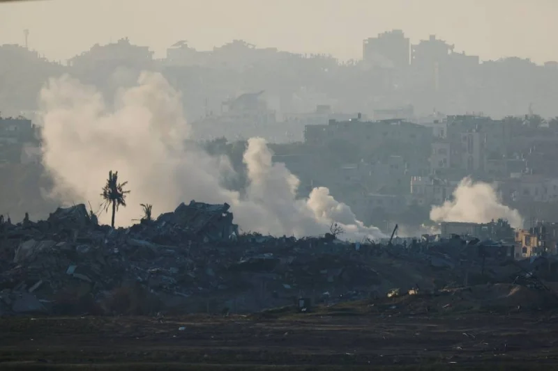 Smoke billows in Gaza as seen from southern Israel, on Saturday. REUTERS