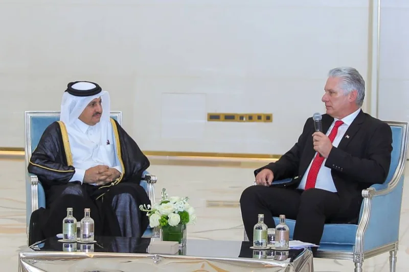 Cuban President Miguel Diaz-Canel and Qatar Chamber chairman Sheikh Khalifa bin Jassim al-Thani during a meeting held in Doha.