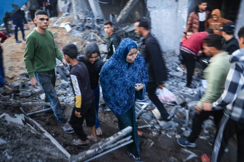 Palestinians check the damages after an Israeli strike in Rafah in the southern Gaza Strip on Sunday. AFP