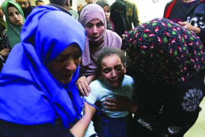 
People react as they rush to the hospital following an Israeli strike, amid the ongoing conflict, at Nasser 
hospital in Khan Yunis in the southern Gaza Strip, yesterday. 