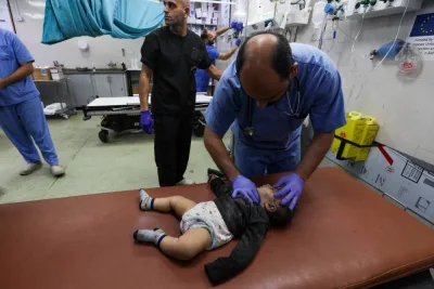 A medical worker assists a wounded Palestinian baby at Nasser hospital, following Israeli strikes, in Khan Younis in the southern Gaza Strip, on Monday. REUTERS