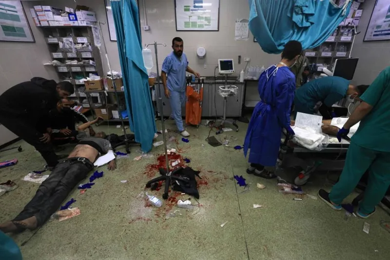 Medics tend to the injured at the Nasser hospital in Khan Yunis in the southern Gaza Strip, following Israeli strikes on Sunday. AFP