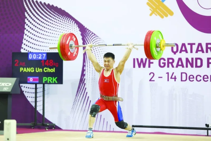 
North Korea’s Pang Un Chol, who won the men’s 55kg competition, in action during the Qatar Cup IWF Grand Prix II at the Aspire Zone yesterday. 