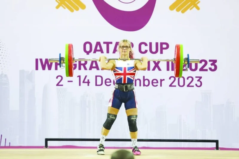 
A British weightlifter prepares to lift the barbell. 
