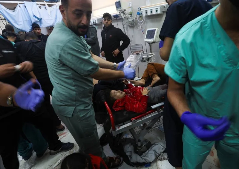 Wounded Palestinians are assisted at Nasser hospital, following Israeli strikes on Ma&#039;an school east of Khan Younis, on Tuesday. REUTERS