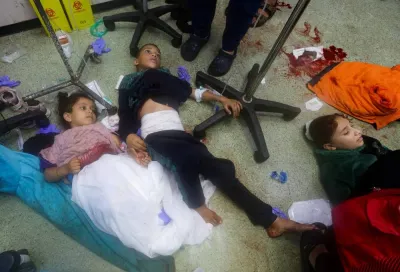 Wounded Palestinian children lie on the floor at Nasser hospital, following Israeli strikes on Ma&#039;an school east of Khan Younis, in Khan Younis in the southern Gaza Strip, on Tuesday. REUTERS