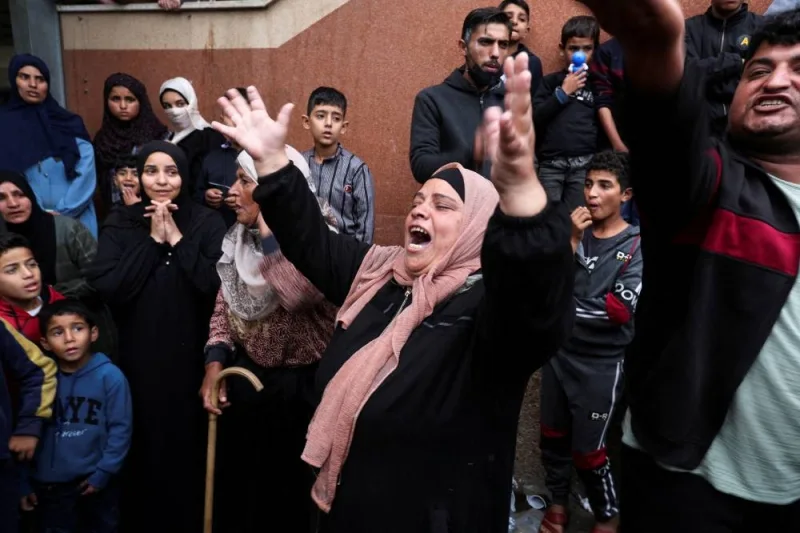 People react, as wounded Palestinians are brought into Nasser hospital, following Israeli strikes on Ma&#039;an school east of Khan Younis, in Khan Younis in the southern Gaza Strip, on Tuesday. REUTERS