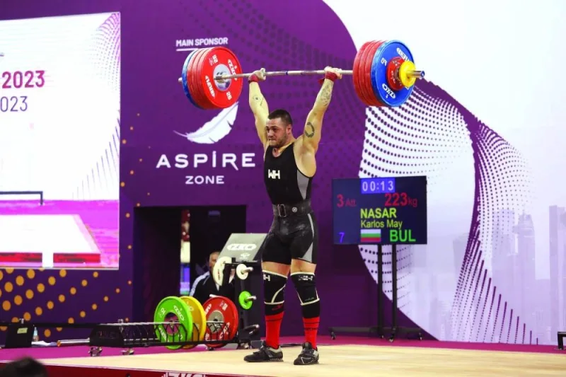 Bulgaria&#039;s Karlos May Nasar on way to victory in the men&#039;s 89kg competition on seven of the Qatar Cup IWF Grand Prix II. Nasar managed an overall lift of 
393kg.