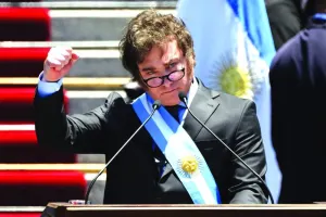 Argentina’s new president Javier Milei gestures as he delivers his inaugural speech before the crowd during an inauguration ceremony at the Congress in Buenos Aires yesterday. (AFP,  Reuters)
