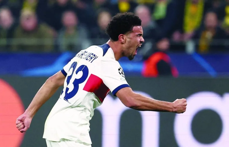 
Paris Saint-Germain’s French midfielder Warren Zaire-Emery celebrates after scoring the goal during the UEFA Champions League match against Borussia Dortmund in Dortmund yesterday. (AFP) 