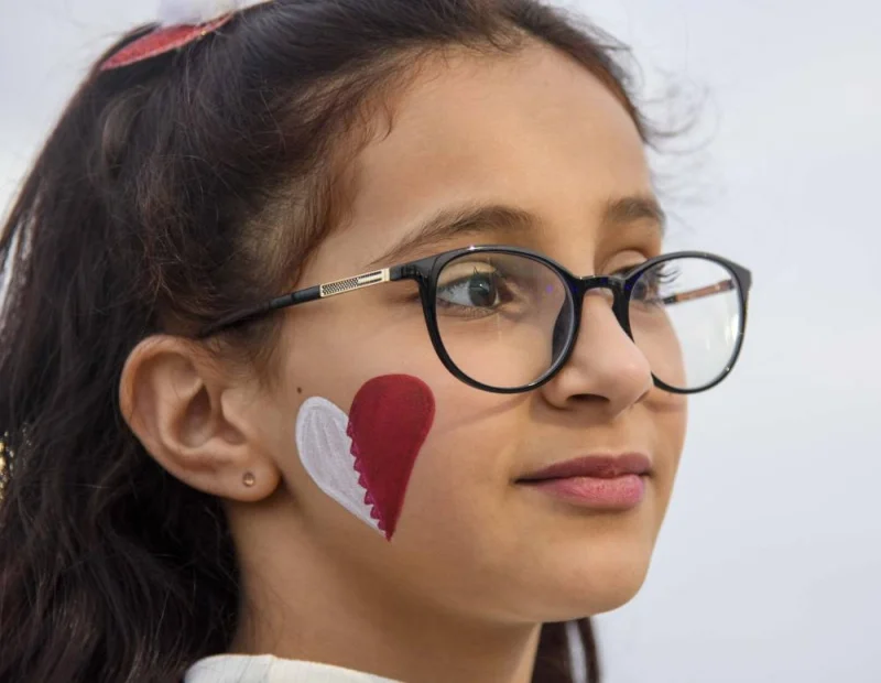 Many children could be seen sporting Qatari colours through face painting at Darb Al Saai. PICTURE: Noushad Thekkayil