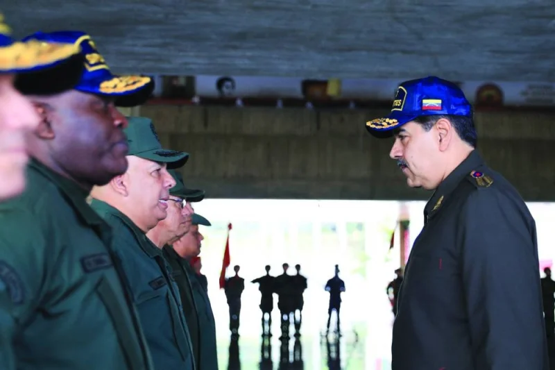 Venezuelan President Nicolas Maduro (right) meets military staff at the Ministry of Defence in Caracas on Thursday. (Reuters)