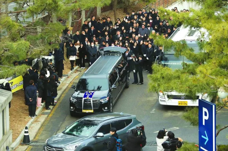 The hearse carrying the casket of late South Korean actor Lee Sun-kyun leaves a funeral hall after his funeral ceremony at the Seoul National University Hospital in Seoul on Friday.