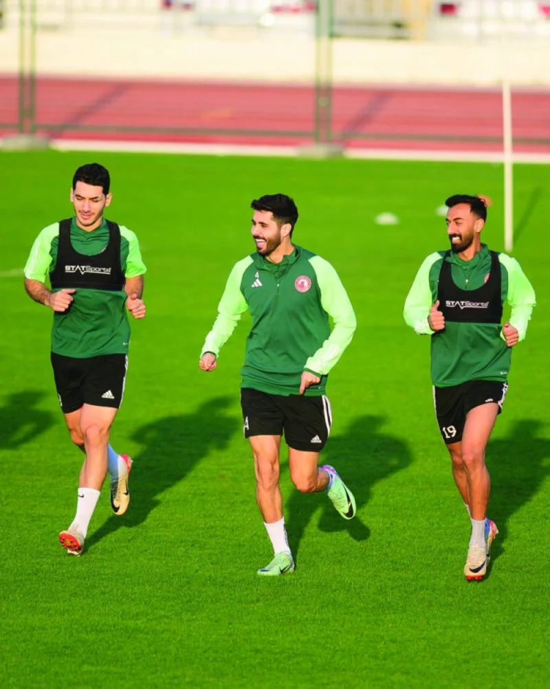 Al Arabi players train on Friday, on the eve of the Ooredoo Cup final.