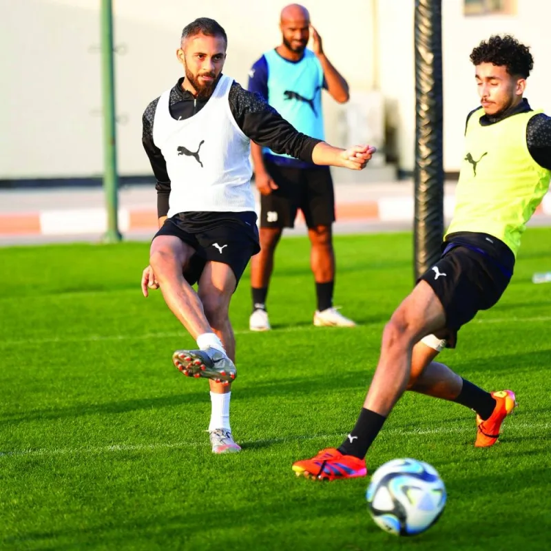 Umm Salal players train on Friday, on the eve of the Ooredoo Cup final.