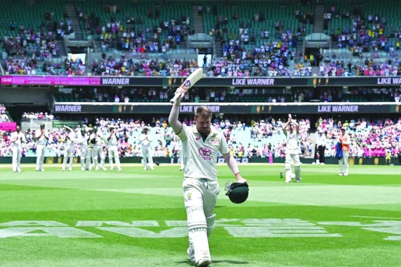 Australia’s David Warner acknowledges the applauds from the spectators as he walks out after dismissal for the last time in his farewell Test at the SCG on Saturday. (AFP)