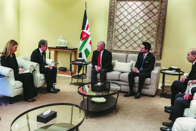 
A handout picture released by the Jordanian Royal Palace shows Jordan’s King Abdullah receiving US 
Secretary of State Antony Blinken in Amman, yesterday. 