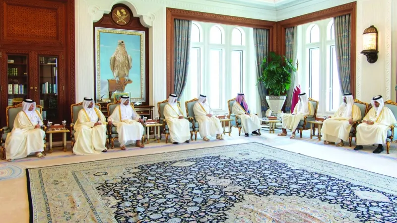 His Highness the Amir Sheikh Tamim bin Hamad al-Thani with the new ministers at the Amiri Diwan Monday