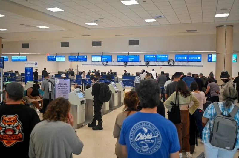 Passengers try to rebook their tickets from cancelled United Airlines flights after US air safety regulator the Federal Aviation Administration (FAA) grounded 171 Boeing 737 MAX 9 jetliners for safety checks because of the emergency landing of an Alaska Airlines plane, at Luis Munoz Marin International Airport in San Juan, Puerto Rico Sunday. REUTERS