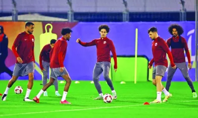 
Qatar players train at the Aspire Academy yesterday, on the eve of their match against Lebanon. (Reuters) 